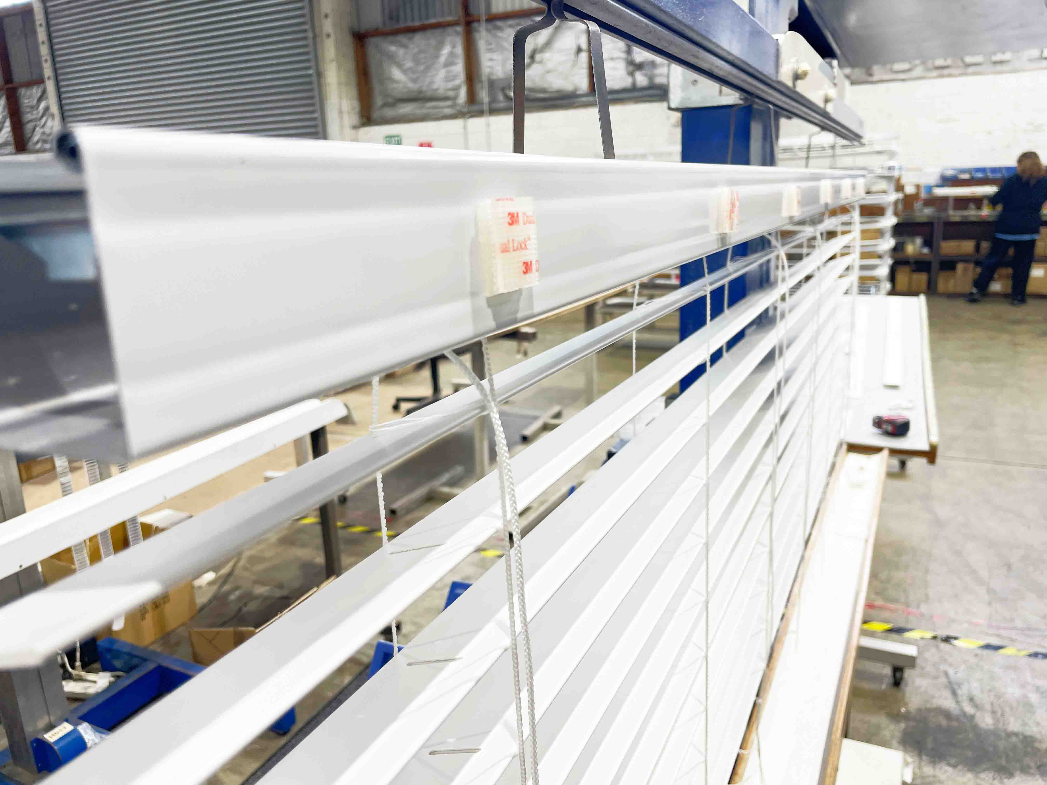 pvc white venetian blinds being assembled in factory